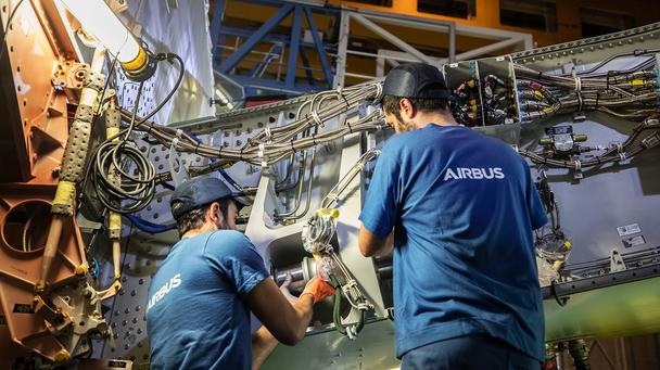 Type training Maintenance personnel working on an aircraft component, ensuring operational safety and efficiency.