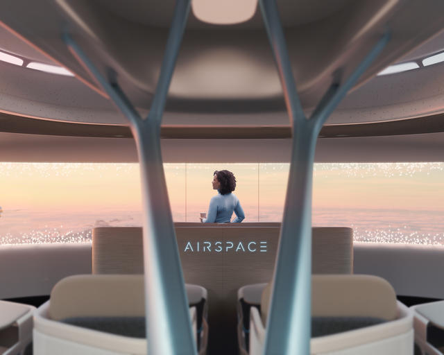 Airspace cabin with aircraft in the background Airspace cabin with lady watching an aircraft flying by