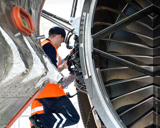A mechanic working on an aircraft