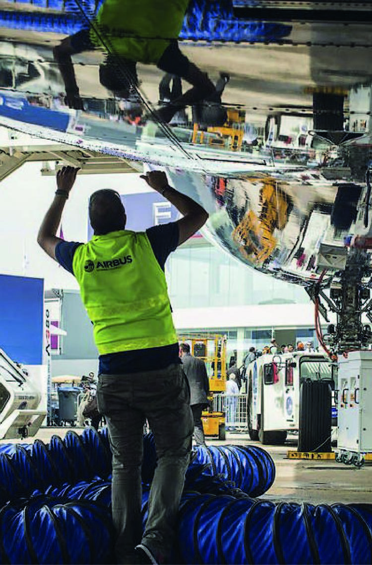 Maintenance technician working on an aircraft to ensure operational safety.