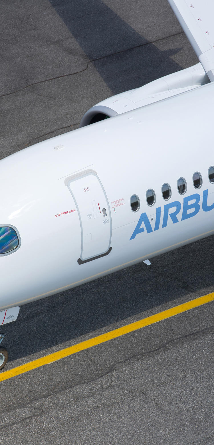 A220-300 A220-300 aircraft preparing for takeoff on the runway